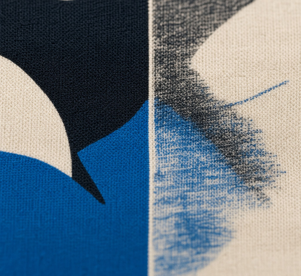 Macro comparison of a sharp printed t-shirt edge beside a feathered, broken one